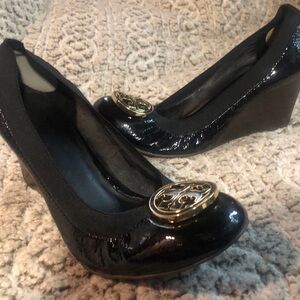 Tory Burch Black Patent Wedge Pumps with Gold Logo Medallion